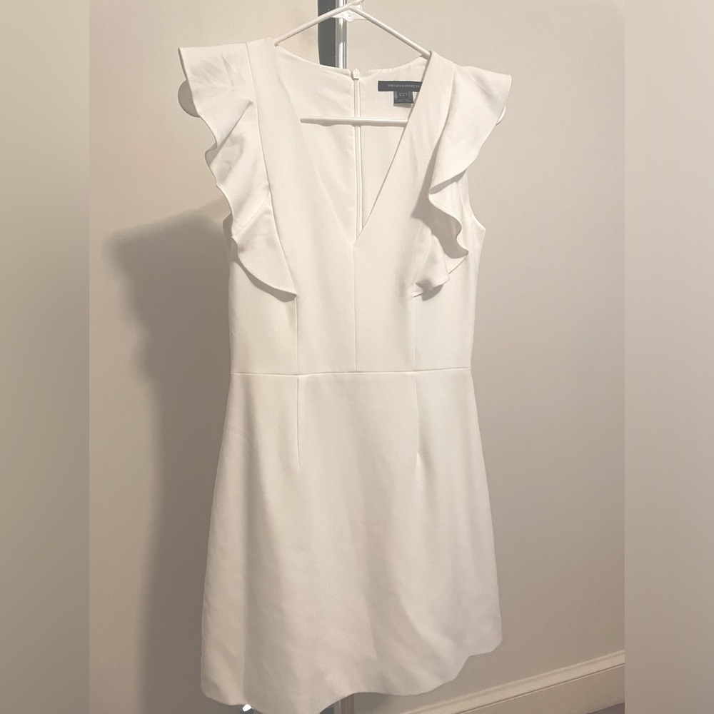 Like new! Wore once for my rehearsal dinner. Super flattering and comfortable!